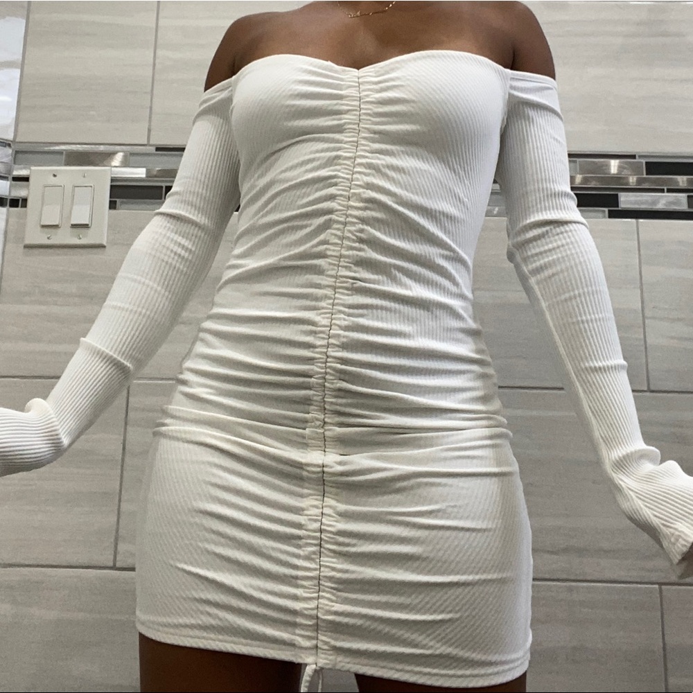 White long flare sleeve ruched mini dress
